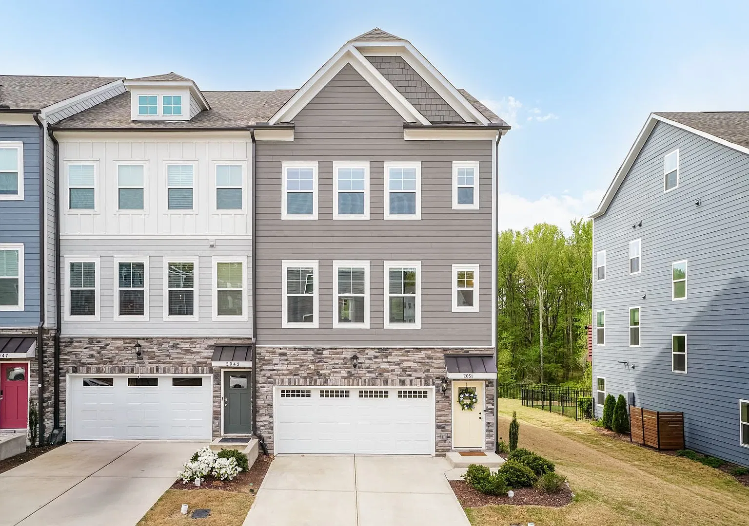 End Unit Townhome in West Village | Apex — Photo 2
