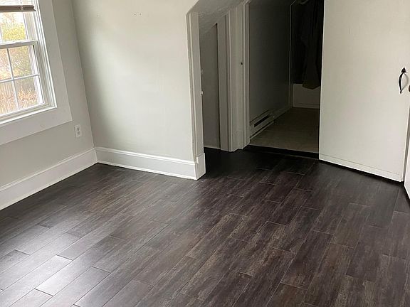 Bedroom looking into bathroom.