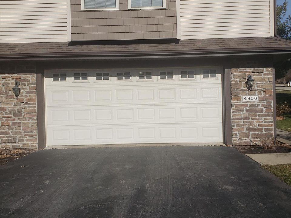 2 car attached garage with 2 garage door openers.