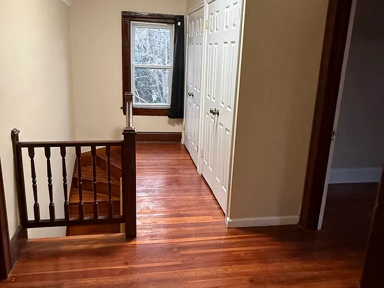 wide hallway with extra storage space