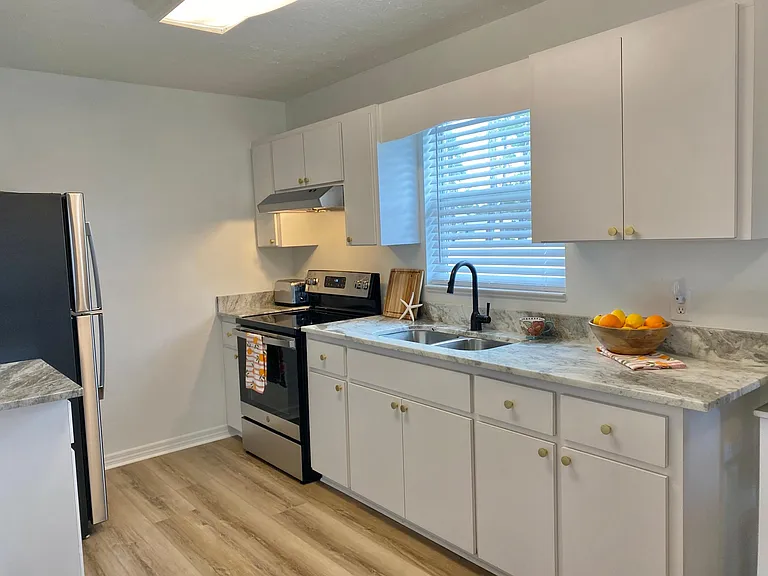 Kitchen - with granite countertops and stainless steel appliances