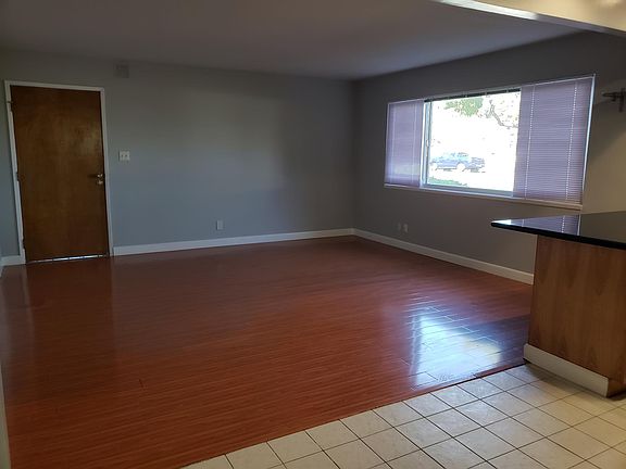 View of living room from kitchen nook.