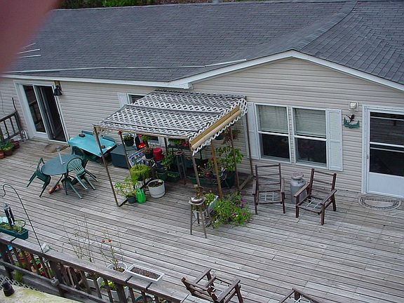 Found a deck I liked, attached to a home
						:
						Overhead view of deck, entry into living room, second door is into family room