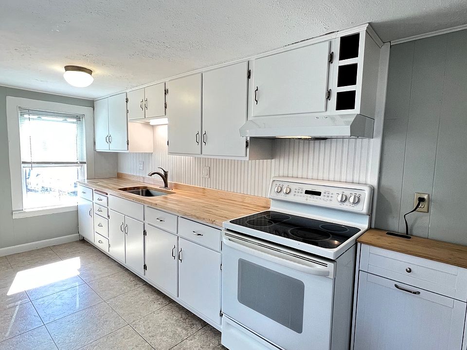 Bright Kitchen with Butcher Block Countertops