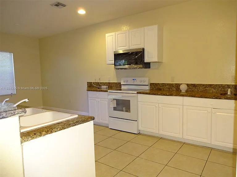 174 NE 32nd Ter #174 — Photo 14