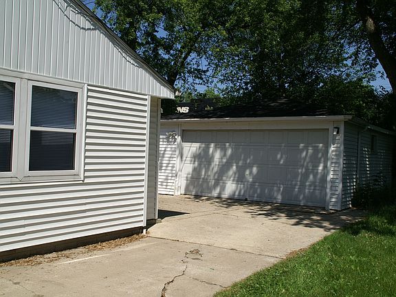 Side Drive and 2 Car Gar