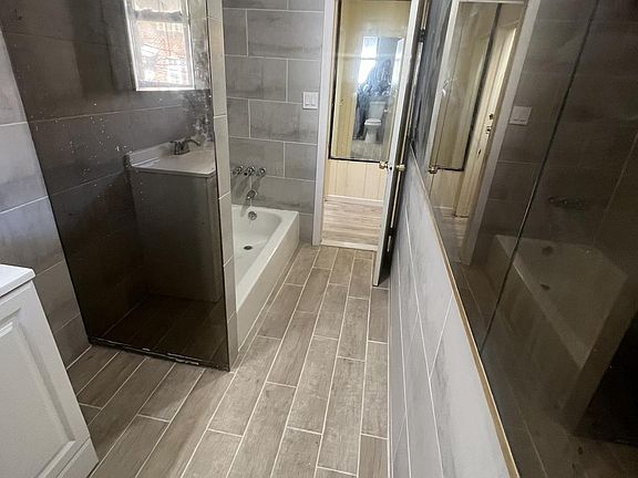 Spacious bathroom is ideal for the person on the go or the individual who wants to pamper themselves.