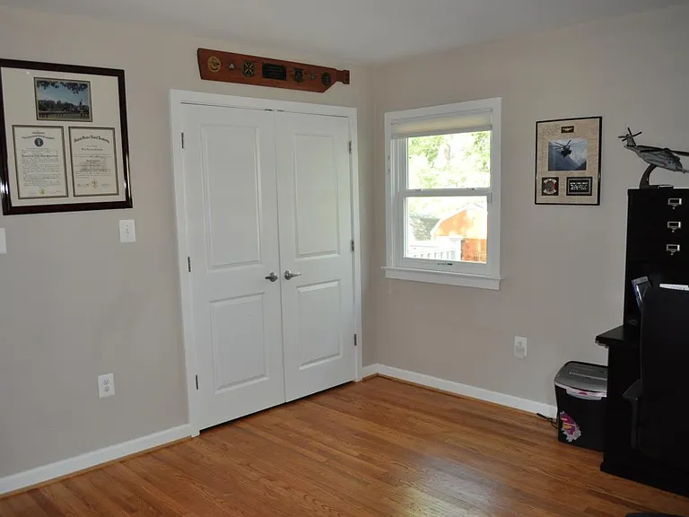 first floor bedroom with double door closet