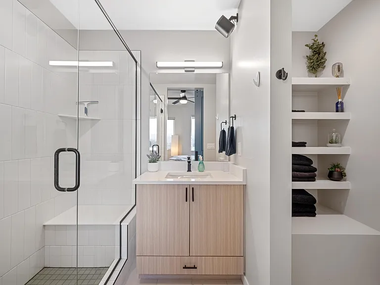 This master en suite bathroom is the perfect place to get dolled up or dolled down. With Sonos speaker, large glass shower with seat, and plenty of extra towels and places to store your toiletries, this bathroom has everything you need to feel fresh!