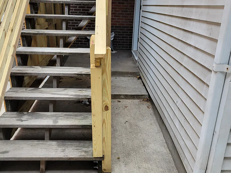rear entrance and small patio area
