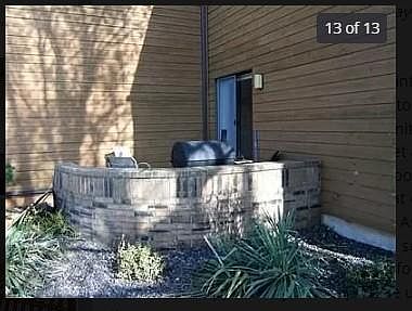 Patio off kitchen-dining area.