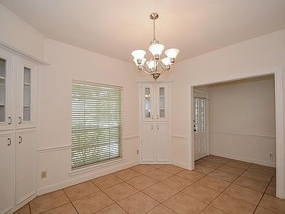 Formal dinning with built in cabinetry.
Possible home office/flex space.