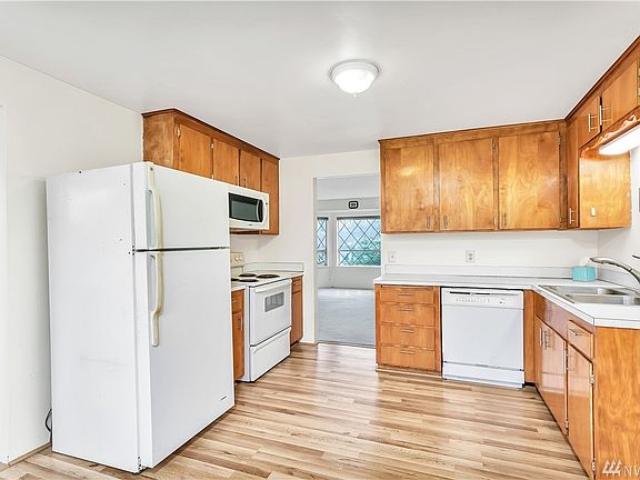 Spacious kitchen with new flooring