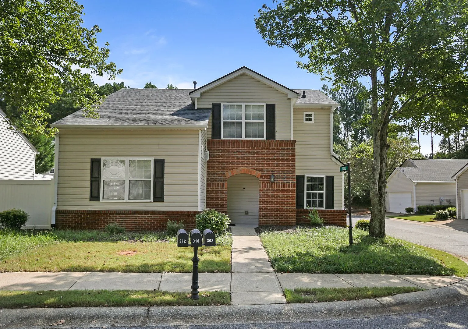 Charming 2-Bedroom, 2.5-Bath Home with Oversized Primary Suite in West Oaks Subdivision — Photo 1