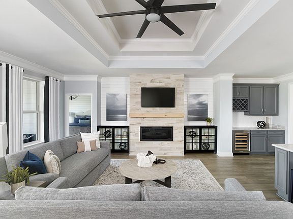 Open Floor Concept Gathering Room with a fireplace.