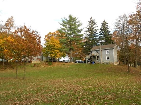 Spacious backyard has room for volleyball net and picnics
