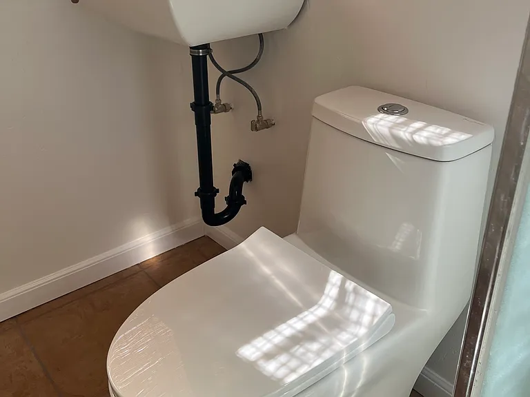 Brand new toilet and sink.