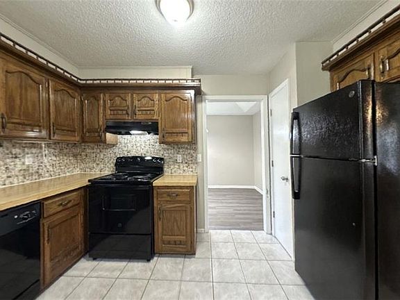 4th image of 12316 E 59th Ter