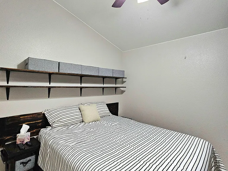Queen Electric Platform Bed, Ceiling Fan.