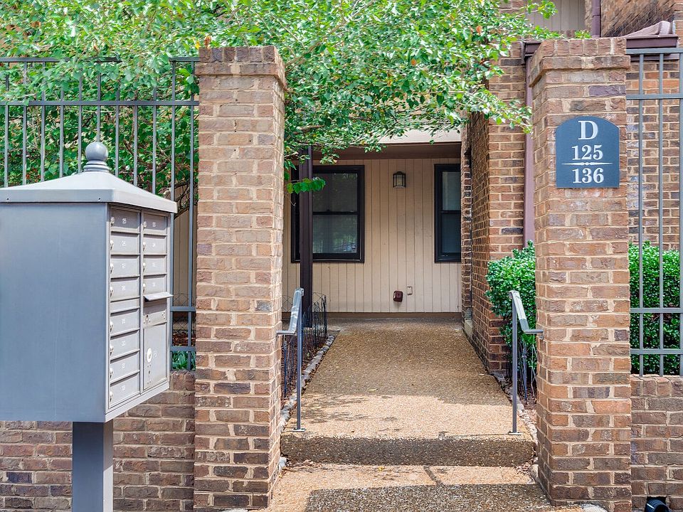 Unit 128 is to the right of this walkway
