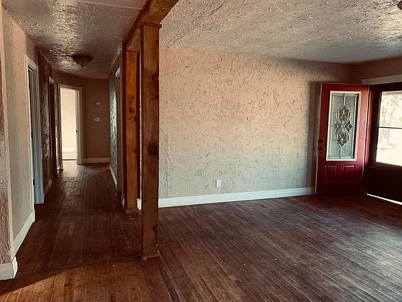 Front door, hall to sleeping quarters.