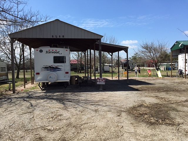 Huge lot with RV and cover