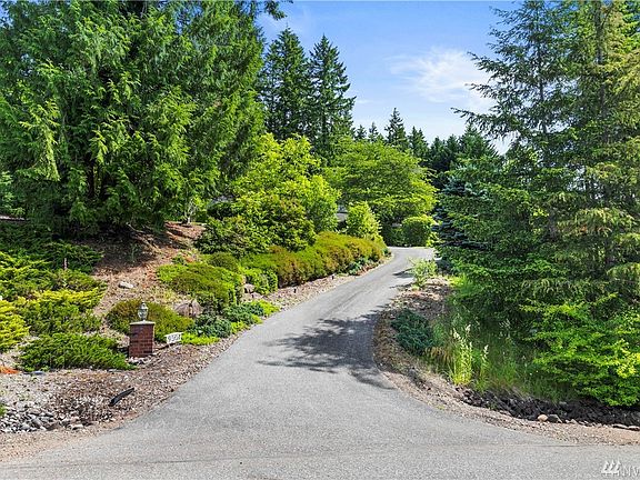 At the top of this private driveway your wonderful home welcomes you