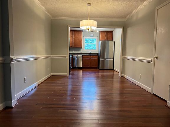 Dining room looking into kitchen.