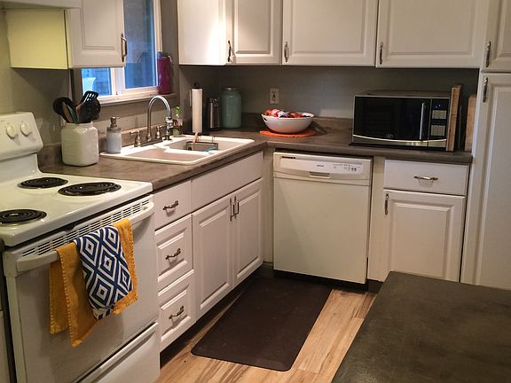 NEW FLOORS & TONS OF STORAGE