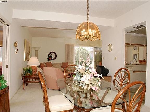 Dining room, condo is being sold turnkey furnished