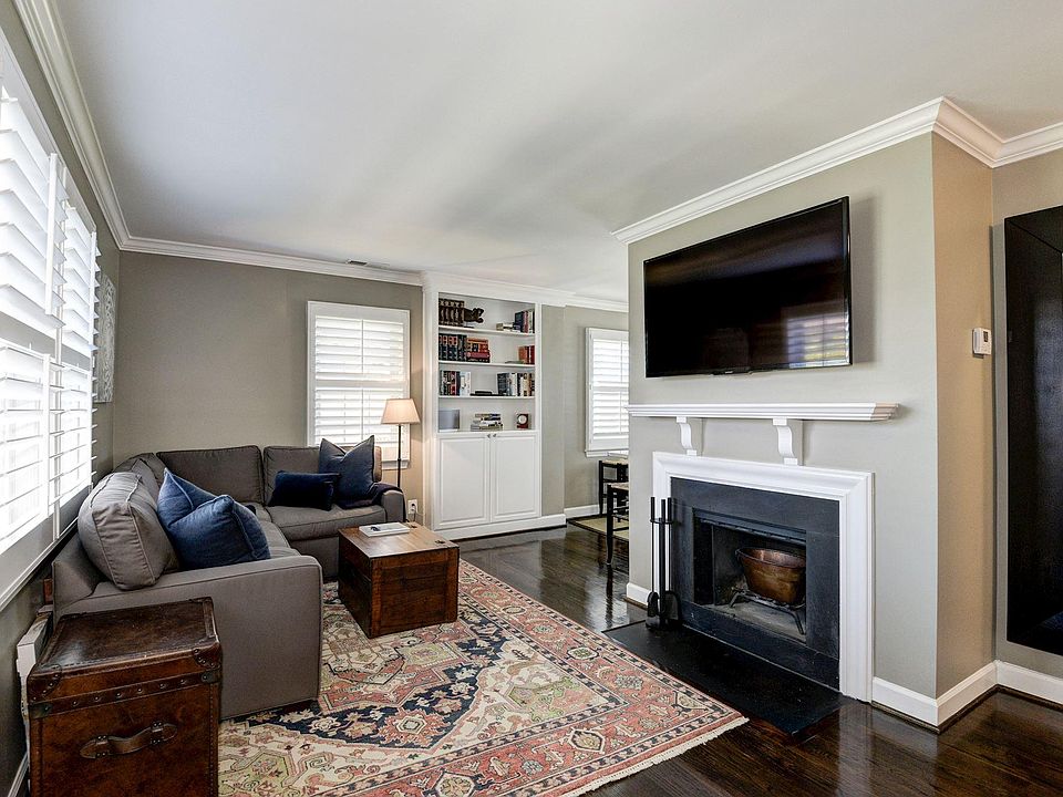 Sunny Living Room with Fireplace