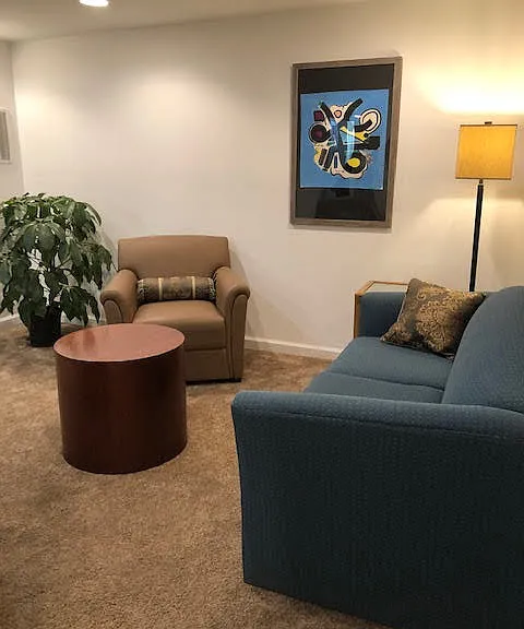 Inviting corner with greenery and art _ adds personality and calm to the space.