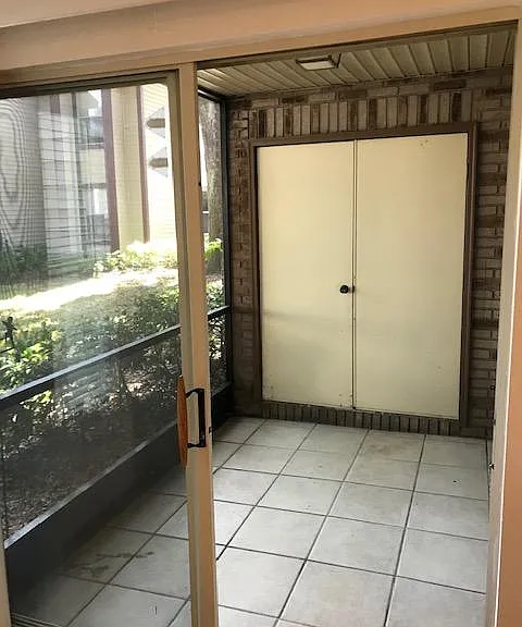 Screened in Lanai and doors open to washer & dryer which are included.