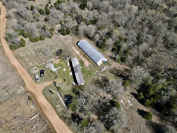 <p>Indoor, Greenhouse, and Outdoor Grow facility aerial</p>