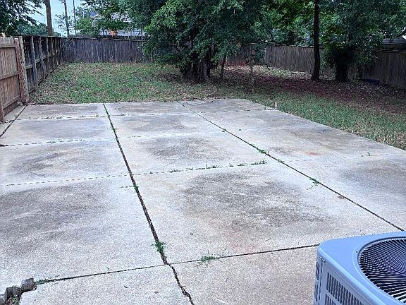 Back yard , lot's space for kids to play, family cookouts on the big concrete patio