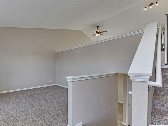 Living room / steps to upper floor Kitchen, bedrooms and steps to basement.