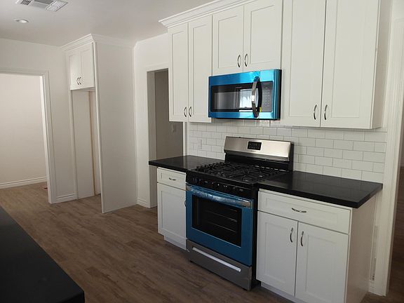 New range/oven/microwave, cabinets, etc