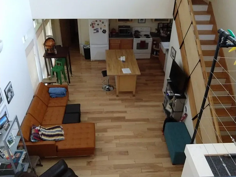 Stairs go up to 2 bedrooms and 1 bathroom on the 2nd floor.