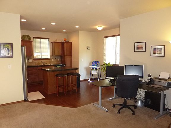 View from great room into kitchen.