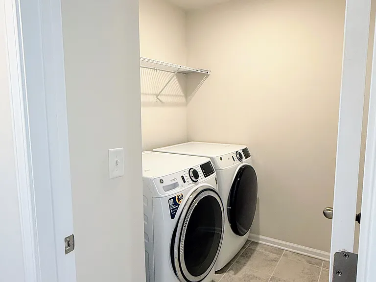 Laundry with brand new GE Profile appliances