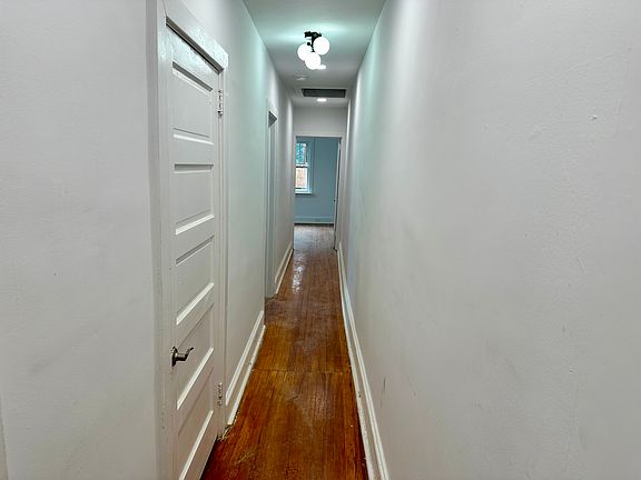 CENTER CORRIDOR connecting bedrooms, bathroom, LAUNDRY ROOM & kitchen.