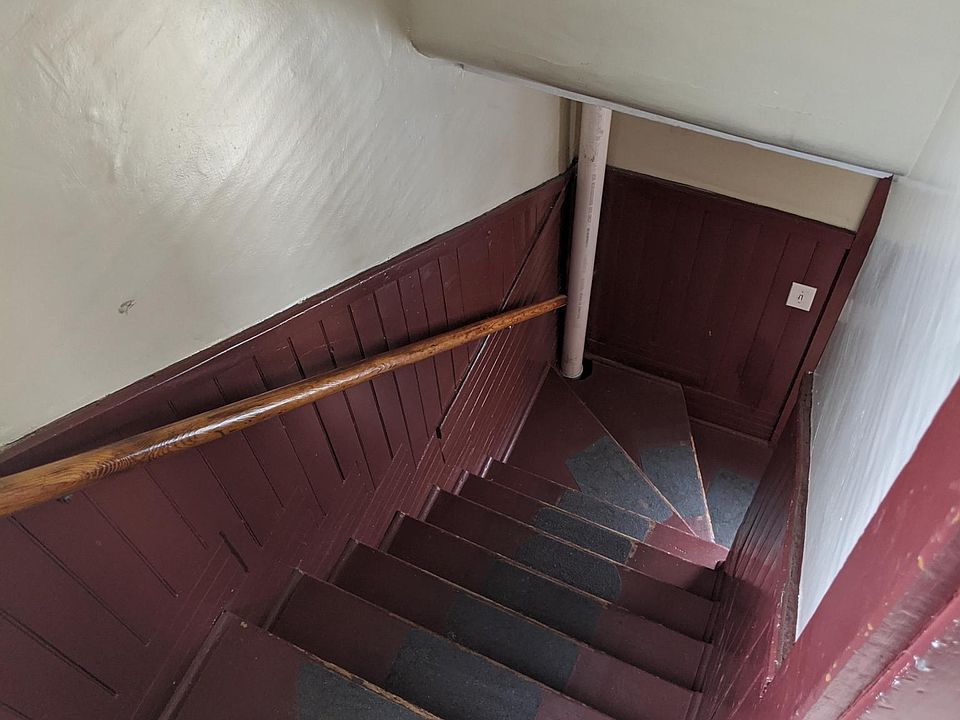 Stairwell to second floor apt.