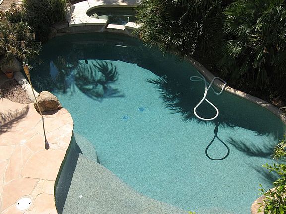 Sparkling Pool is Lush Peaceful Tropical Surroundings