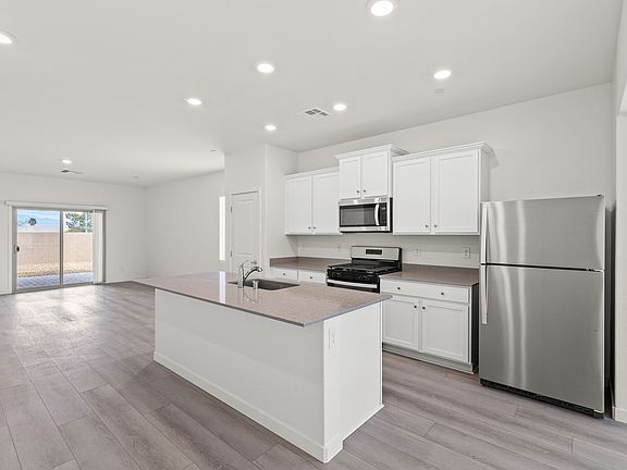 The Mead floor plan features a chef-ready kitchen perfect for all your cooking needs.