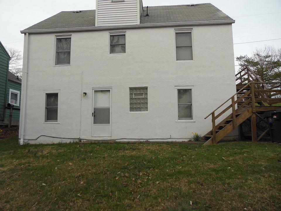 Entrance to 226 apt. Deck and stairs on right. Free off-street parking lot is to right of deck. Stairs and deck lead to parking lot.