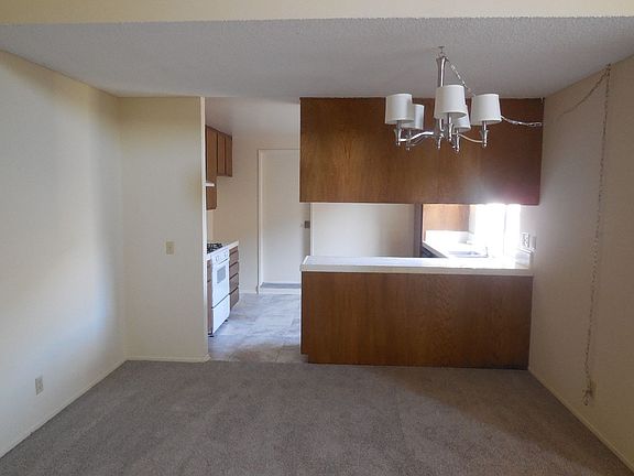 Dining room next to the pass through counter in the kitchen