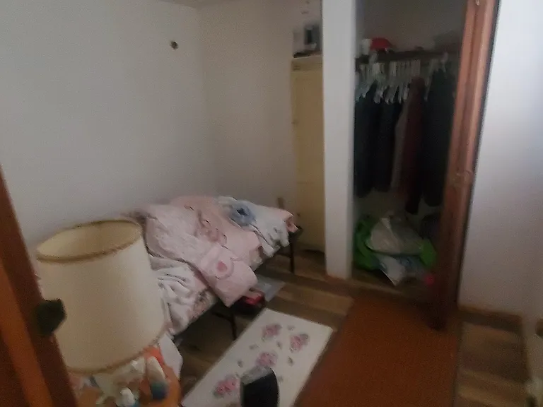 Furnished bedroom photo