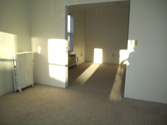 LIVING ROOM TO DINING ROOM.