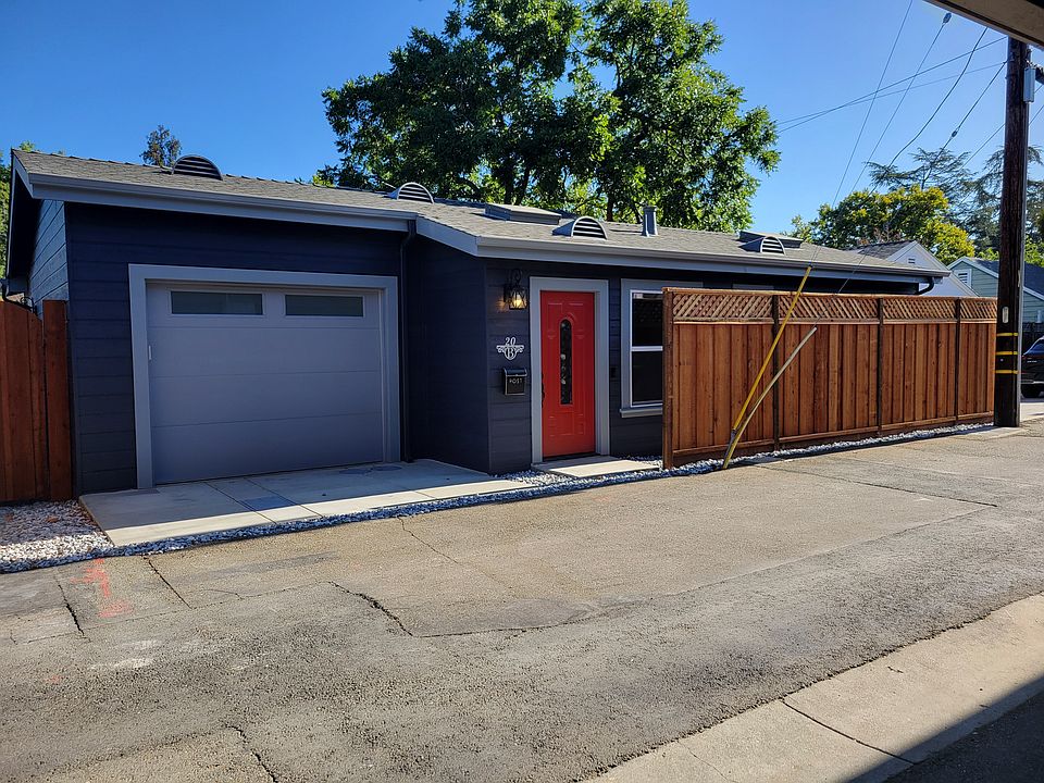 House and garage open into the alley for private entry and exit. No windows face the main home on property. Property is fenced other than garage entry.