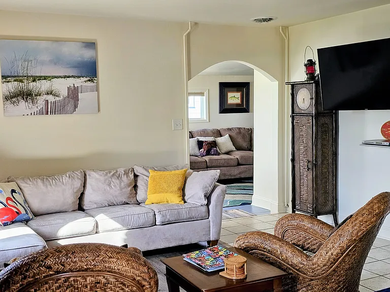 Sunlit living room overlooking lower Adirondack Mountains and Saratoga Lake wild life